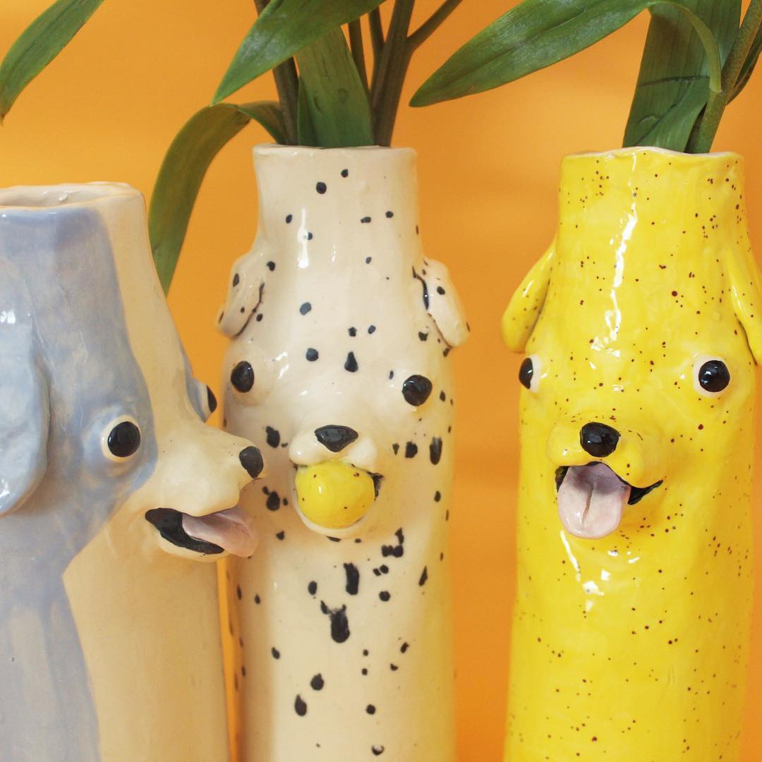 Ceramic dog vases by Katie Kimmel