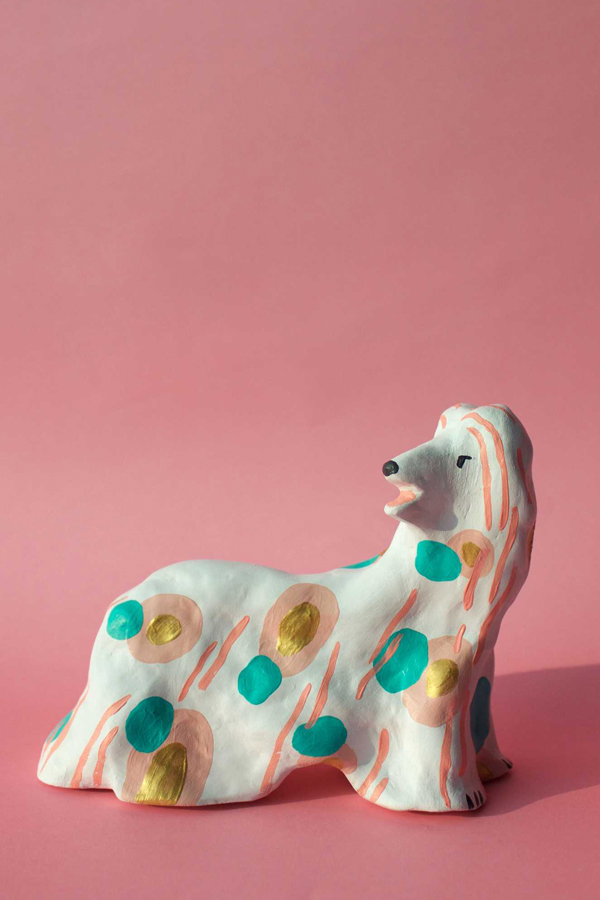 Ceramic dog sculpture by Charlene Man