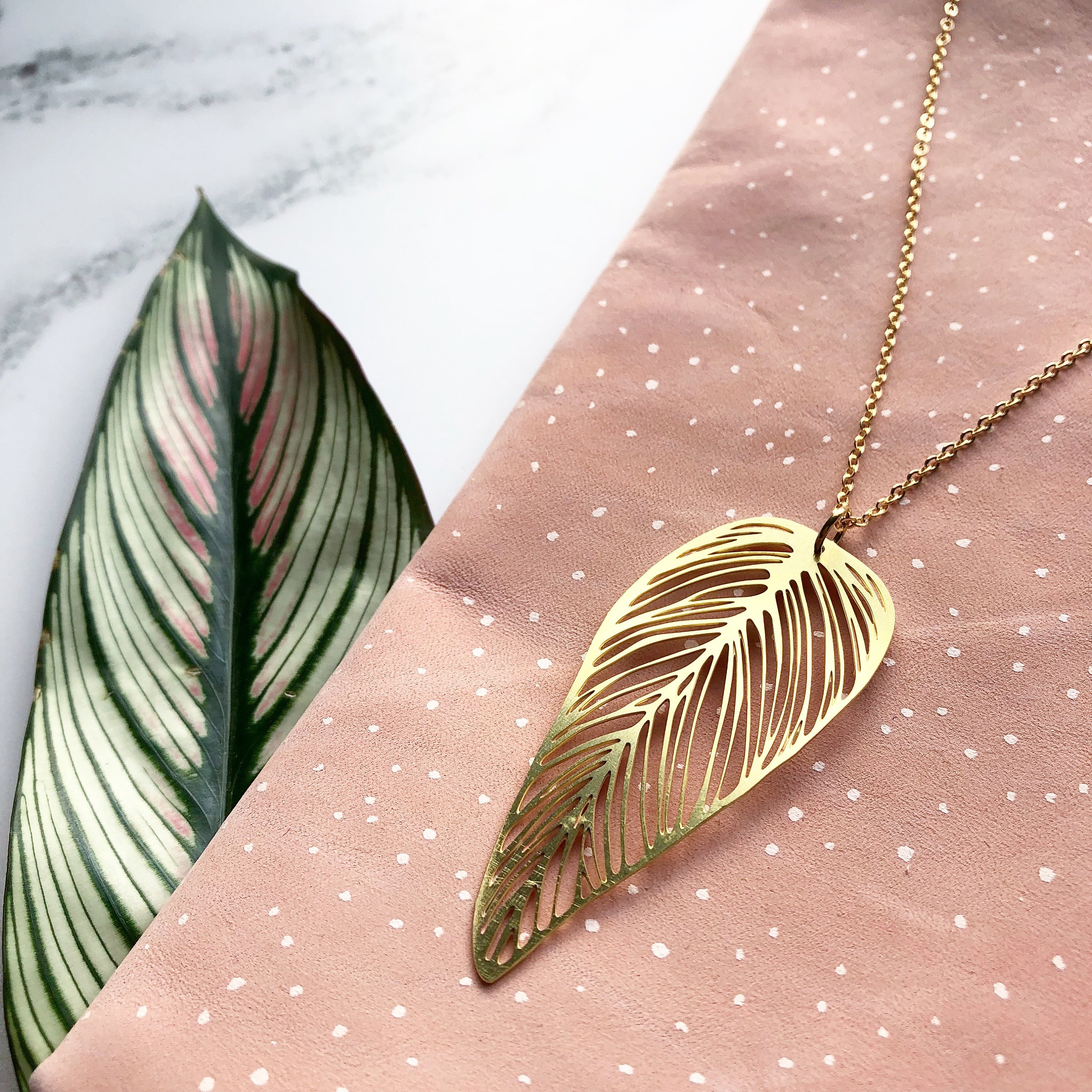 Gold leaf necklace by Mica Peet