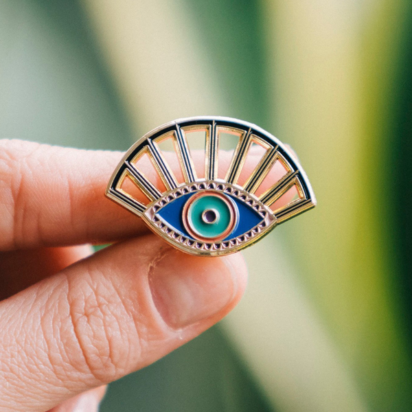 Evil eye enamel pin