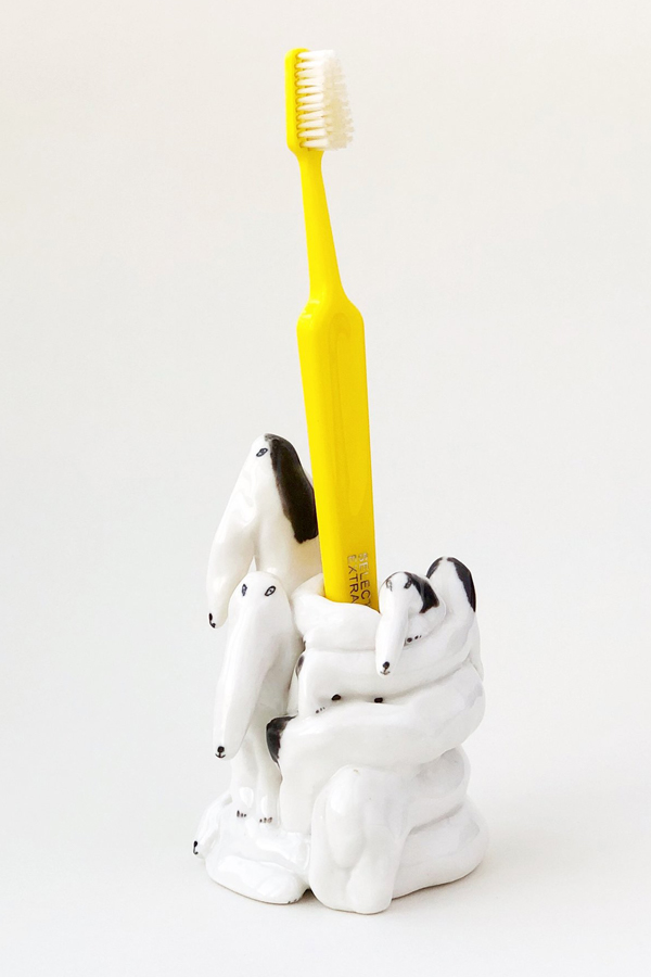 Ceramic dog toothbrush holder