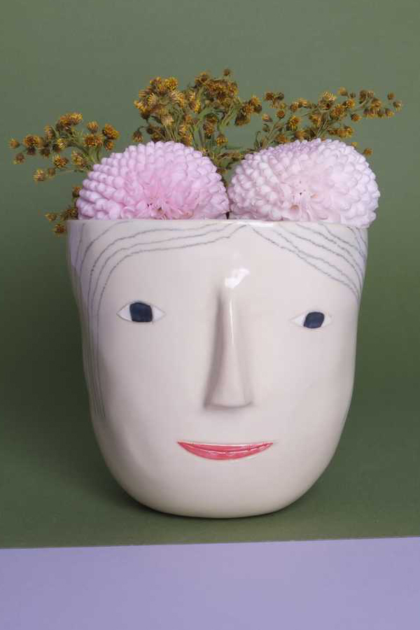 Ceramic face vase by Rachel Sender