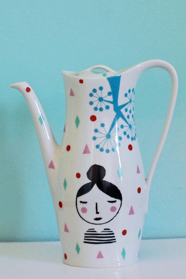 Vintage pitcher with contemporary illustration