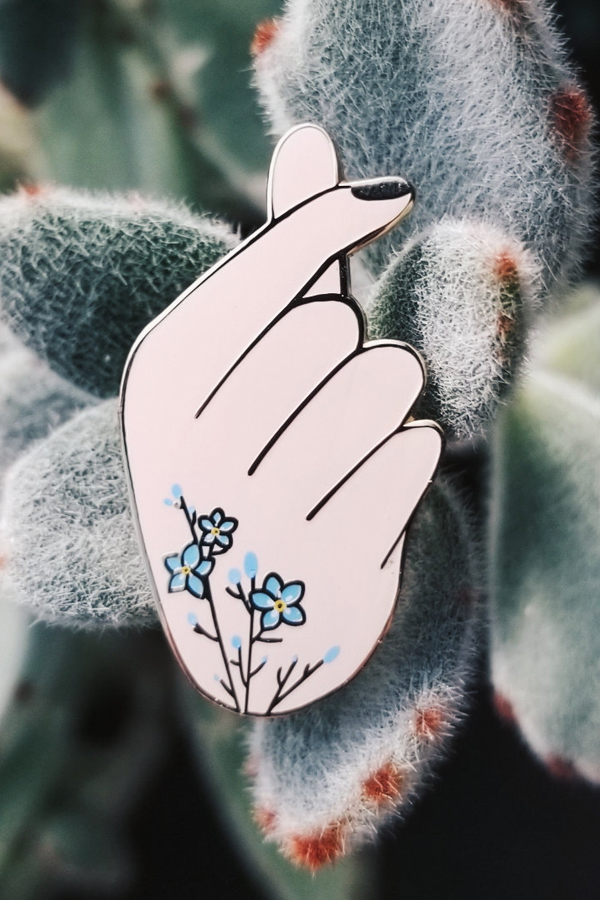 Plant-inspired enamel pin by Hemleva