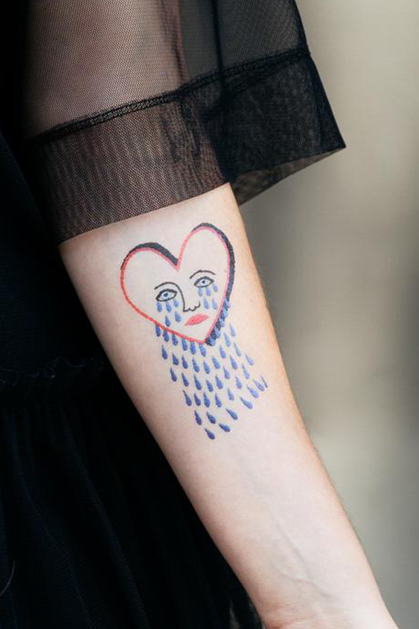 A HEART TATTOO WITH THE WORD PADELUCHO  ImagesAI Diffusion