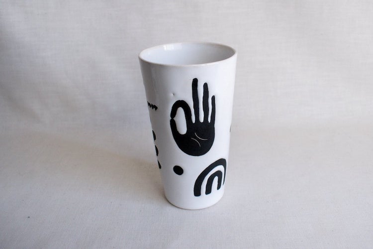 Illustrated ceramic cup