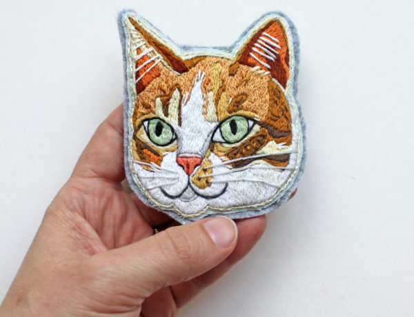 Custom embroidered patch of a cat