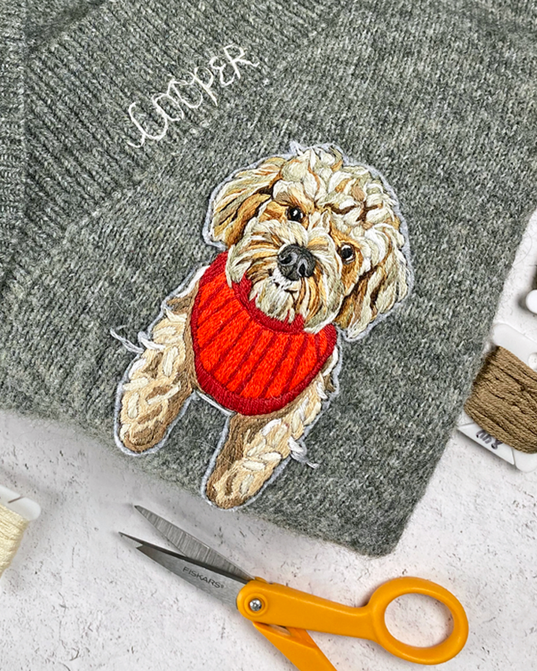 Custom pet portrait on sweater by Brown Paper Stitch