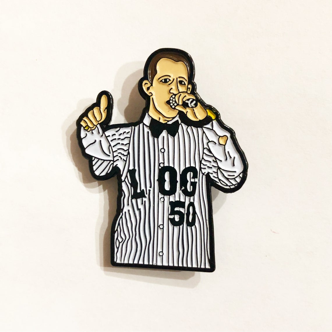 Succession enamel pin