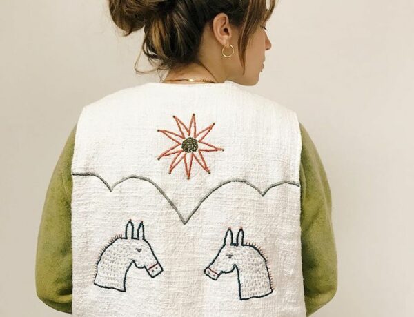 Embroidery on clothing by Madeleine Kemsley