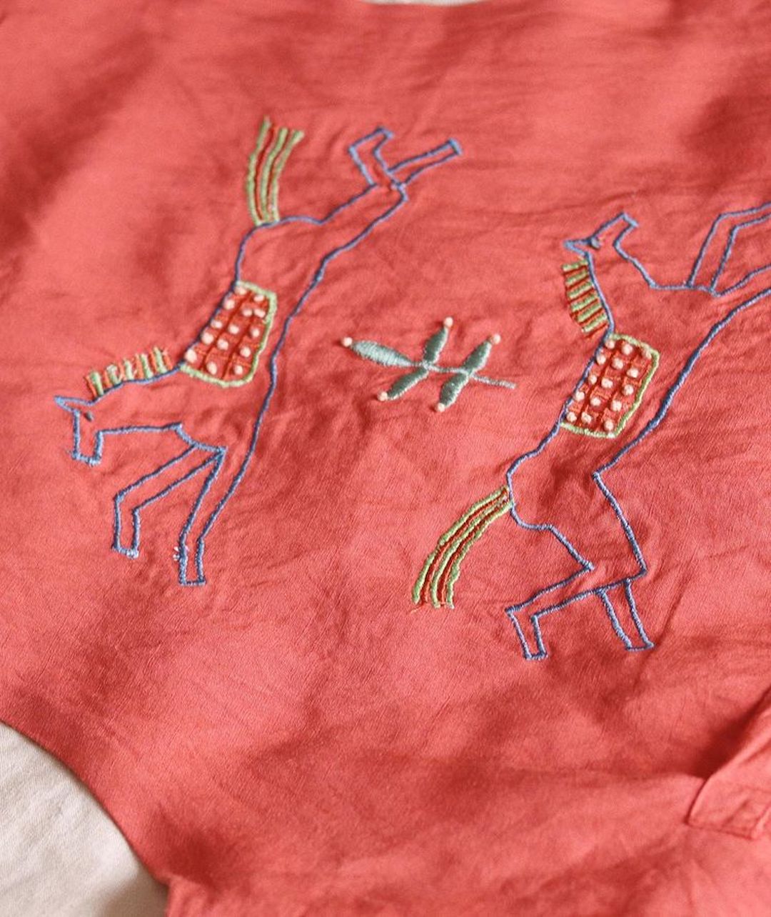 Embroidery on clothing by Madeleine Kemsley