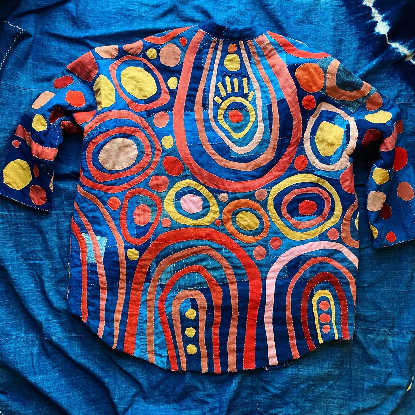 Embroidery and appliqué on a shirt by Lindzeanne