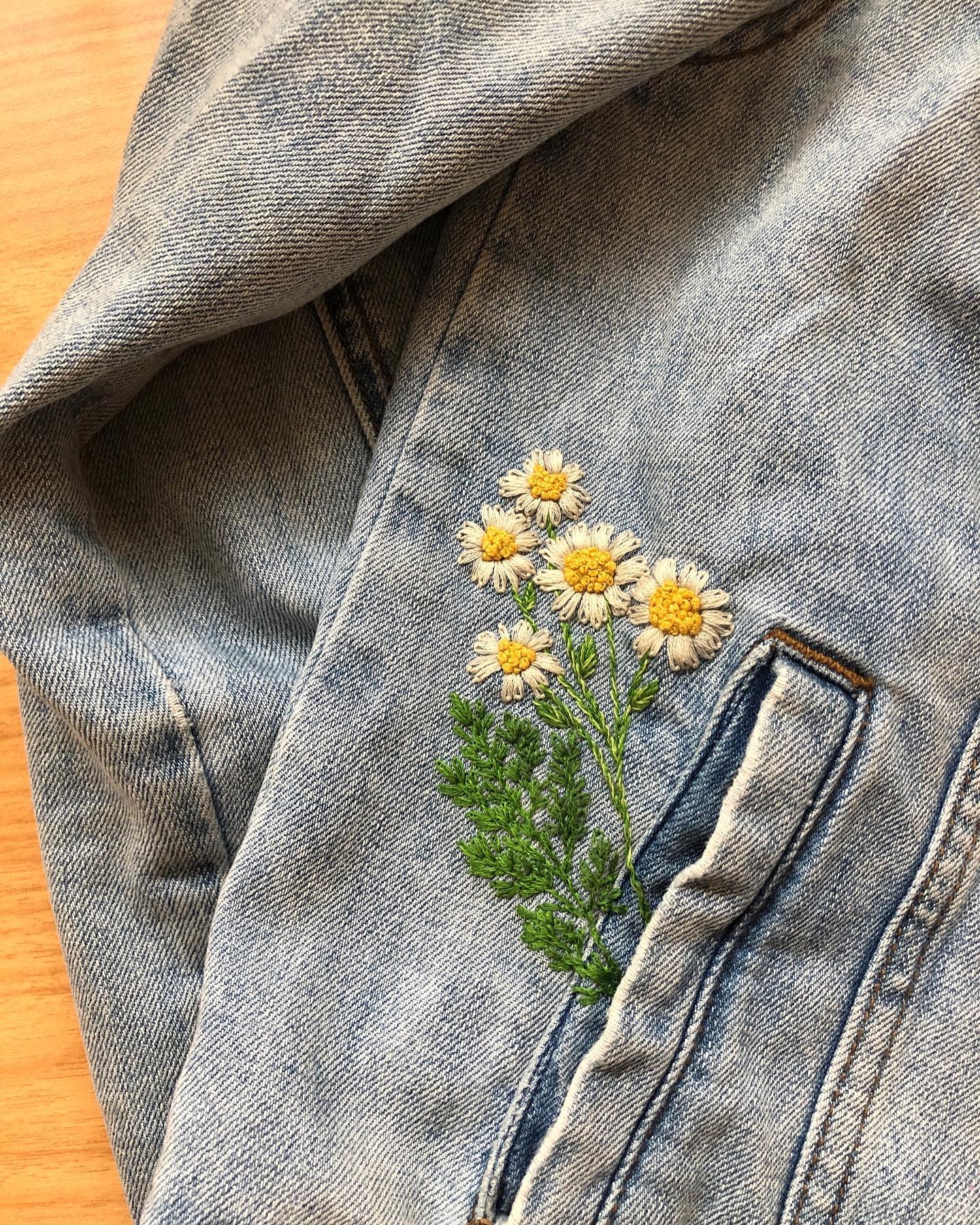 Embroidered flower on a jean jacket by Melissa Galbraith of MCreativeJ