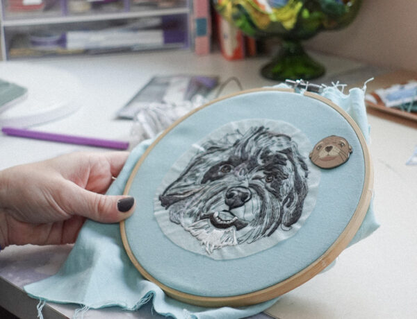 Sara Barnes of Bear&Bean embroidering a custom pet portrait