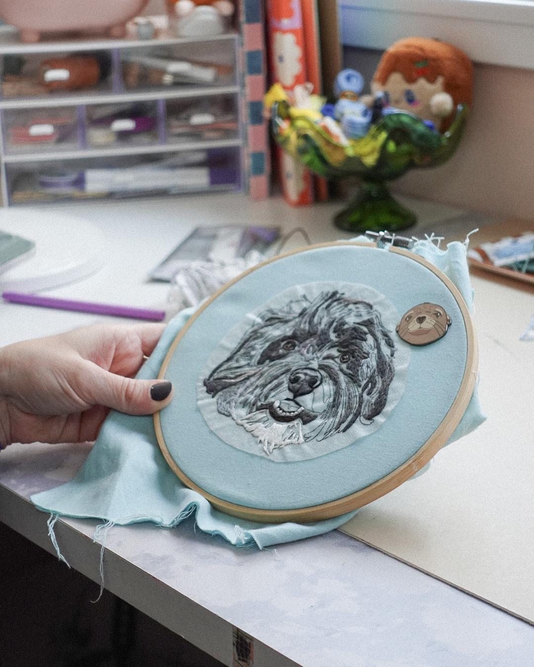 Sara Barnes of Bear&Bean embroidering a custom pet portrait